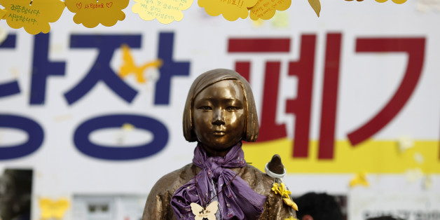 SEOUL, SOUTH KOREA - AUGUST 14: The Statue of Girl stands on the Peace Road, in front of Japanese Embassy on August 14, 2016 in Seoul, South Korea. The activists held a ceremony to mark the 25th anniversary of Kim Hak-sun's comfort women testimony amid the talks between ministers of Japan and South Korea are in progress on the details how $9.9 million funds be spent for Reconciliation and Healing Foundation for the surviving comfort women. (Photo by Woohae Cho/Getty Images)