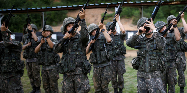 South Korean soldiers take part in a firearms training at a military base near the demilitarized zone separating the two Koreas in Paju, South Korea, July 13, 2016. REUTERS/Kim Hong-Ji SEARCH "BALLET SOLDIERS" FOR THIS STORY. SEARCH "THE WIDER IMAGE" FOR ALL STORIES. TPX IMAGES OF THE DAY