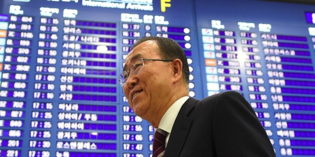 Former UN secretary-general Ban Ki-moon (C) arrives at the Incheon International Airport, west of Seoul, on January 12, 2017.Retired UN Secretary General Ban Ki-Moon returned to South Korea on January 12 after strongly hinting that he would run in the next presidential elections to succeed impeached President Park Geun-Hye. / AFP / JUNG Yeon-Je (Photo credit should read JUNG YEON-JE/AFP/Getty Images)