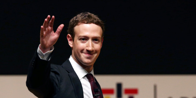 Facebook founder Mark Zuckerberg waves to the audience during a meeting of the APEC (Asia-Pacific Economic Cooperation) Ceo Summit in Lima, Peru, November 19, 2016. REUTERS/Mariana Bazo