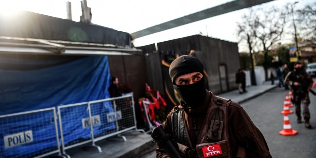 A Turkish special force police officer walks in front of the Reina nightclub on January 4, 2017 in Istanbul, three days after a gunman killed 39 people on New Year's night.
The gunman had fought in Syria for Islamic State jihadists, a report said on January 3, as Turkish authorities intensified their hunt for the attacker. Of the 39 dead, 27 were foreigners, mainly from Arab countries, with coffins repatriated overnight to countries including Lebanon and Saudi Arabia. / AFP / OZAN KOSE (Photo credit should read OZAN KOSE/AFP/Getty Images)