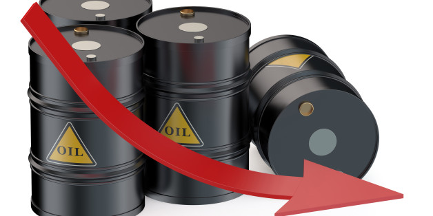 Oil price falling concept with oil barrels