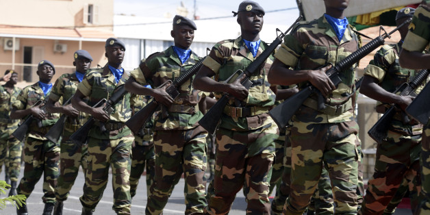Soldiers parade during the closing ceremony of the three-week joint military exercise between African, US and European troops, known as Flintlock, on February 29, 2016 in Saint Louis.
Some 1,700 members of the special forces from nearly thirty countries from Africa, America and Europe, including France and Britain, are taking part in military exercises from February 8-29 according to AFRICOM, the military command of the USA for Africa.
/ AFP / SEYLLOU (Photo credit should read SEYLLOU/AFP/Getty Images)