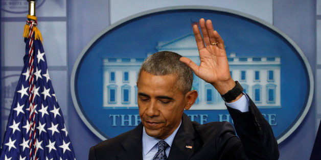 U.S. President Barack Obama waves as he departs the briefing room at the conclusion of his final press conference at the White House in Washington, U.S., January 18, 2017. REUTERS/Kevin Lamarque TPX IMAGES OF THE DAY