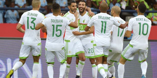 Algeria's forward Riyad Mahrez (back C) celebrates with teammates after scoring a goal during the 2017 Africa Cup of Nations group B football match between Algeria and Zimbabwe in Franceville on January 15, 2017. / AFP / KHALED DESOUKI (Photo credit should read KHALED DESOUKI/AFP/Getty Images)