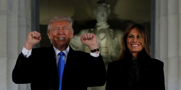 U.S. President-elect Donald Trump and his wife Melania take part in a Make America Great Again welcome concert in Washington, U.S. January 19, 2017. REUTERS/Jonathan Ernst
