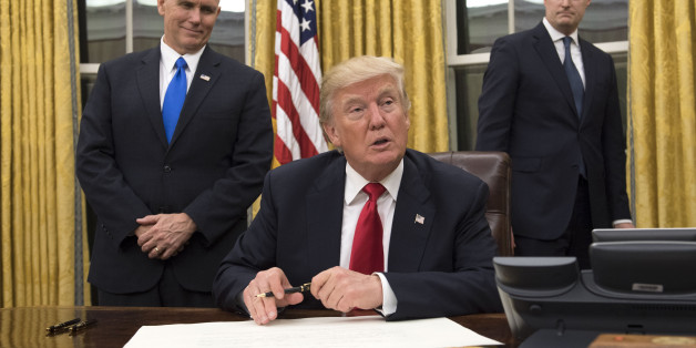 WASHINGTON, DC - JANUARY 20: President Donald Trump speaks to the media before signing a confirmation for Defense Secretary James Mattis in the Oval Office at the White House in Washington, D.C. on January 20, 2017. (Photo by Kevin Dietsch - Pool/Getty Images)