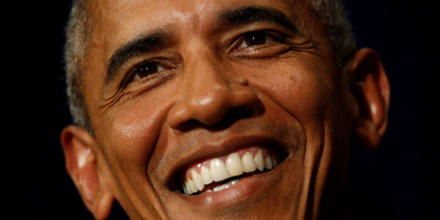 U.S. President Barack Obama smiles at a question about comments by Donald Trump as he holds a news conference at the conclusion of his participation in the ASEAN Summits in Vientiane, Laos September 8, 2016. REUTERS/Jonathan Ernst