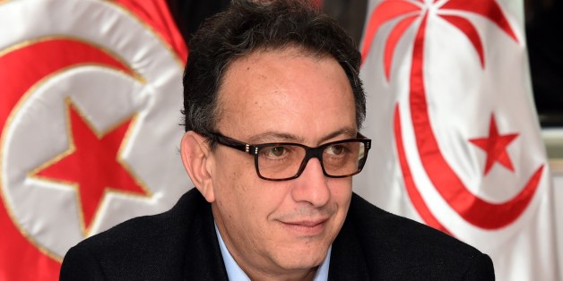 Hafedh Caid Essebsi, Vice-President of Tunisia's ruling Nidaa Tounes party and son of the Tunisian President Beji Essebsi, attends a meeting for the Executive Bureau of the party on November 12, 2015 in Tunis, to try to solve the problems that the party has experienced in recent months. The secularist Nidaa Tounes, elected to power last year in a vote hailed as a democratic victory after Tunisia's Arab Spring revolt, has been riven by months of infighting and 31 lawmakers from the party resigned from their parliamentary bloc on November 9, deepening a row over party succession. AFP PHOTO / FETHI BELAID (Photo credit should read FETHI BELAID/AFP/Getty Images)