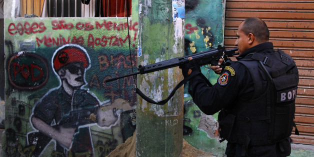 Rio de Janeiro, Brazil - June 28, 2012: The Special Operations Battalion BOPE, police carried out a raidwith the purpose of drug enforcement in the favela of Vila Cruzeiro, in the 'Alemão' Complex in the early morning. This is one of the biggest shanty town in Rio de Janeiro and used to be the hideout of drug dealers, a big Rio de Janeiro problem.