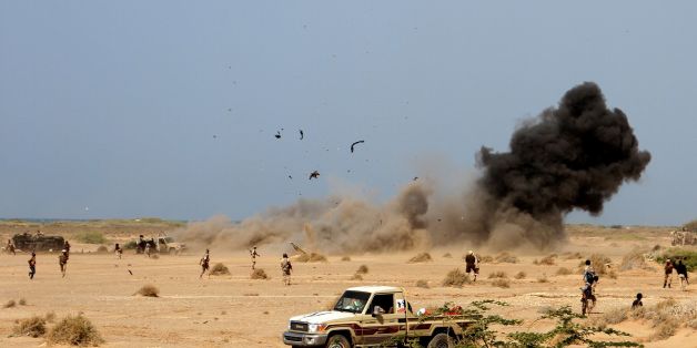 A landmine explodes as Yemeni loyalist forces patrol an area near the Red Sea port town of Mocha on January 20, 2017. / AFP / SALEH AL-OBEIDI (Photo credit should read SALEH AL-OBEIDI/AFP/Getty Images)