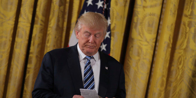 U.S. President Donald Trump attends a swearing in ceremony for senior staff at the White House in Washington, DC January 22, 2017. REUTERS/Carlos Barria