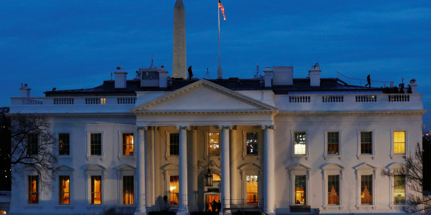 Security personnel walk on the roof of then White House near Pennsylvania Avenue before Inauguration Day for U.S. President-elect Donald Trump in Washington, U.S., January 20, 2017. REUTERS/Lucas Jackson