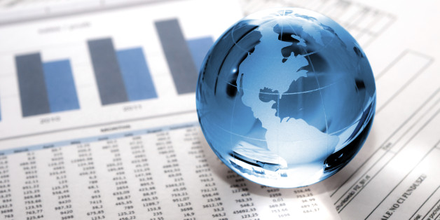 Glass globe with North America and business papers