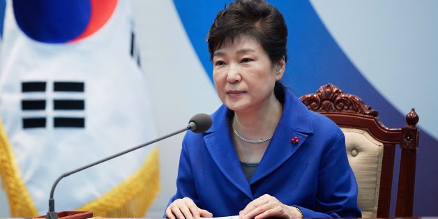 SEOUL, SOUTH KOREA - DECEMBER 09: In this handout photo released by the South Korean Presidential Blue House, South Korea's President Park Geun-Hye attends the emergency cabinet meeting at the presidential office on December 9, 2016 in Seoul, South Korea. The South Korean National Assembly voted for an impeachment motion at its plenary session, which will set up the rare impeachment trial for President Park over the accusation of corruption involving Park and her long time confidante. (Photo b