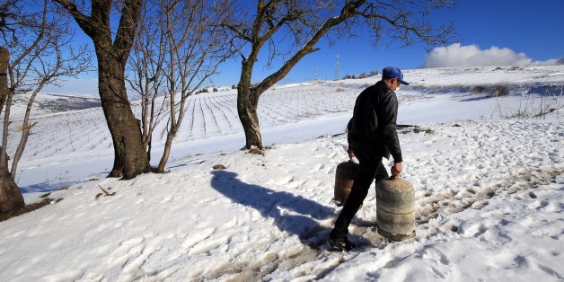 Village ain el maleh in medea wilaya, 80 km southwest of Algiers, cooking gas bottles and some major products have been in short supply for several days due to a rare wave of cold and snow in Algeria on 18 January 2017. (Photo by Billal Bensalem/NurPhoto via Getty Images)