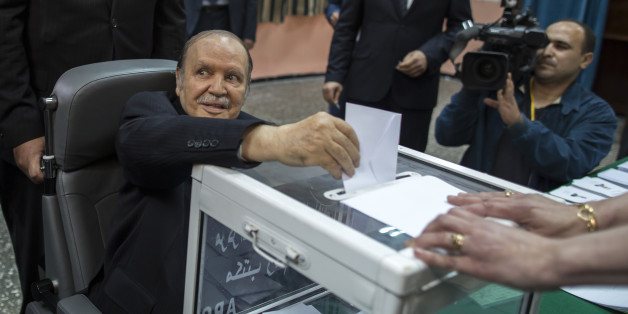 Algeria's President Abdelaziz Bouteflika casts his ballot during the presidential election in Algiers April 17, 2014. Algerians voted on Thursday in the election Bouteflika is expected to win after 15 years in power, despite speaking only rarely in public since suffering a stroke in 2013. REUTERS/Zohra Bensemra (ALGERIA - Tags: POLITICS ELECTIONS TPX IMAGES OF THE DAY)