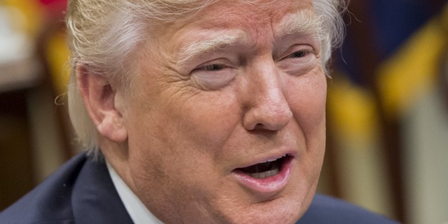 US President Donald Trump speaks during a meeting with automobile industry leaders in the Roosevelt Room of the White House in Washington, DC, January 24, 2017. / AFP / SAUL LOEB (Photo credit should read SAUL LOEB/AFP/Getty Images)