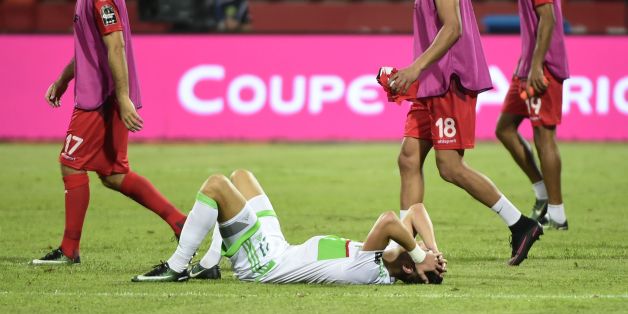 Algeria's defender Rami Bensebaini reacts at the end of the 2017 Africa Cup of Nations group B football match between Algeria and Tunisia in Franceville on January 19, 2017. / AFP / KHALED DESOUKI (Photo credit should read KHALED DESOUKI/AFP/Getty Images)
