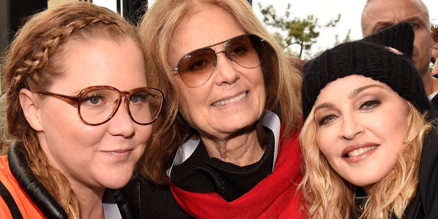 WASHINGTON, DC - JANUARY 21: (L-R) Amy Schumer, Gloria Steinem and Madonna attend the rally at the Women's March on Washington on January 21, 2017 in Washington, DC. (Photo by Kevin Mazur/WireImage)