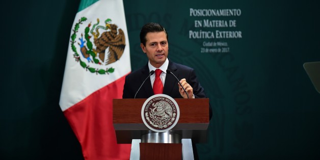 Mexican President Enrique Pena Nieto gives a foreign policy speech after US President Donald Trump vowed to start renegotiating North American trade ties, in Mexico City on January 23, 2017.
Trump's vows to scrap the North American Free Trade Agreement to protect US jobs have raised concern in Mexico, which sends most of its exports to the United States. Pena Nieto's office said he congratulated Trump on taking office in a phone call Saturday and that both had agreed to open a 'new dialogue.' / AFP / Ronaldo SCHEMIDT (Photo credit should read RONALDO SCHEMIDT/AFP/Getty Images)