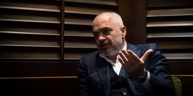 Albanian Prime Minister Edi Rama gestures during an interview in Belgrade on October 13, 2016.
Serbia should recognise its former southern province Kosovo, which 'is a state,' Rama said on October 13 during a visit to Belgrade. 'It is over, Kosovo is a state, it is a state recognized by major world powers,' Rama told AFP, adding that 'people made their choice'. Kosovo unilaterally declared independence from Serbia in 2008, a decade after the end of the 1998-1999 war, but Belgrade, backed by its traditional ally Russia, has refused to recognise the move. / AFP / Andrej ISAKOVIC (Photo credit should read ANDREJ ISAKOVIC/AFP/Getty Images)