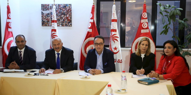 Hafhed Caid Essebsi (C), son of Tunisian president Beji Caid Essebsi, meets with Nidaa Tounes party leaders in Tunis, Tunisia November 3, 2015. Tensions between two wings of Nidaa Tounes, whose name means Call of Tunis, spilled over into violence last week when a party meeting descended into open fighting with fists and sticks. A split within Nidaa Tounes could trigger political instability in the country that launched the first of the Arab Spring revolutions in 2011. Thirty-two of Nidaa Tounes' 86 lawmakers have already threatened to break away in protest at what they see as attempts by President Beji Caid Essebsi, who founded the secular party in 2012, to impose his son Hafhed as its leader. The president's office rejects those accusations. REUTERS/Zoubeir Souissi