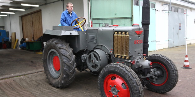 Rusocin, Poland 6th, November 2014 Student of the school of agricultural mechanization in Rusocin restored historic farm tractor Ursus C451. Tractor was destroyed, and standing as a sculpture in front of the school for several years. Now after a year of hard work it is fully functional and riding. (Photo by Michal Fludra/NurPhoto) (Photo by NurPhoto/NurPhoto via Getty Images)