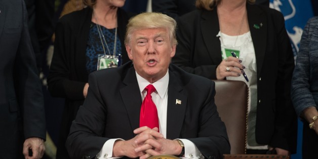 US President Donald Trump speaks after signing an executive order to start the Mexico border wall project at the Department of Homeland Security facility in Washington, DC, on January 25, 2017. / AFP / NICHOLAS KAMM (Photo credit should read NICHOLAS KAMM/AFP/Getty Images)