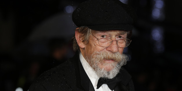 Actor John Hurt arrives for the European premiere of the film "The Imitation Game" at the BFI opening night gala at Leicester Square in London October 8, 2014. REUTERS/Suzanne Plunkett (BRITAIN - Tags: ENTERTAINMENT)