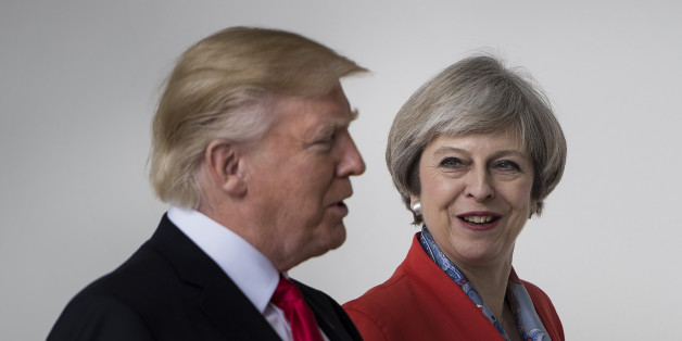 US President Donald Trump and British Prime Minister Theresa May walk at the White House on January 27, 2017 in Washington, DC. / AFP / Brendan Smialowski (Photo credit should read BRENDAN SMIALOWSKI/AFP/Getty Images)