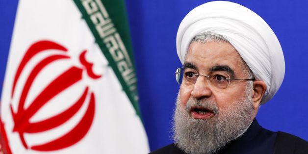 Iranian President Hassan Rouhani gives a press conference in Tehran on Jaunary 17, 2017, to mark the first anniversary of the implementation of a historic nuclear deal. / AFP / ATTA KENARE (Photo credit should read ATTA KENARE/AFP/Getty Images)