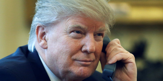 U.S. President Donald Trump speaks by phone with the Saudi Arabia's King Salman in the Oval Office at the White House in Washington, U.S. January 29, 2017. REUTERS/Jonathan Ernst