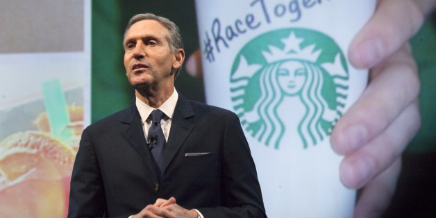 Starbucks Corp Chief Executive Howard Schultz, pictured with images from the company's new "Race Together" project behind him, speaks during the company's annual shareholder's meeting in Seattle, Washington March 18, 2015. Schultz has deftly navigated thorny issues such as gay marriage, gun control and Congressional gridlock, but his move to weigh in on U.S. race relations has brewed up a social media backlash. The company kicked off the discussion when it published full-page ads in major U.S. n
