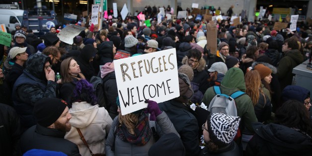 NEW YORK, UNITED STATES - JANUARY 28: Immigration activists stage a protest against President Donald Trump's 90-days ban of entry on 7 Muslim-majority countries in JFK airport in New York, U.S.A on January 28, 2017. (Photo by Mohammed Elshamy/Anadolu Agency/Getty Images)