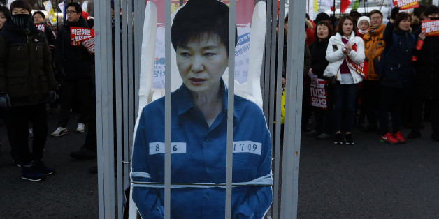 SEOUL, SOUTH KOREA - DECEMBER 10: Protesters gathered and occupy major streets in the city center for a rally against South Korean President Park Geun-Hye on December 10, 2016 in Seoul, South Korea. The South Korean National Assembly voted yesterday for an impeachment motion at its plenary session, which will set up the rare impeachment trial for President Park over the accusation of corruption involving Park and her long time confidante. (Photo by Chung Sung-Jun/Getty Images)