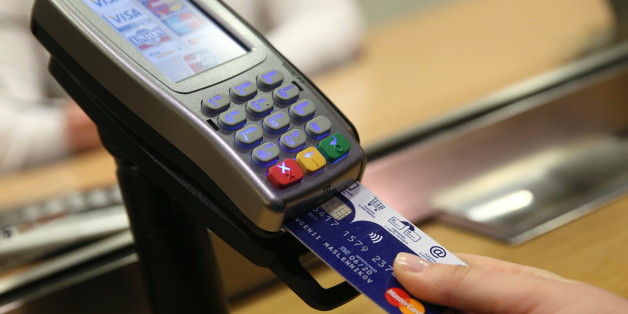 MOSCOW, RUSSIA - NOVEMBER 23, 2016: A commuter pays her fare using a bank card and a chip-and-pin machine at Vystavochnaya station on Filyovskaya Line of the Moscow Underground (Metro). Dmitry Serebryakov/TASS (Photo by Dmitry Serebryakov\TASS via Getty Images)