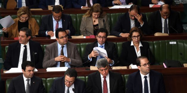 Tunisian prime minister Youssef Chahed (R) attends with his cabinet a state budget meeting, at the parliament in Tunis on November 18, 2016. / AFP / FETHI BELAID (Photo credit should read FETHI BELAID/AFP/Getty Images)
