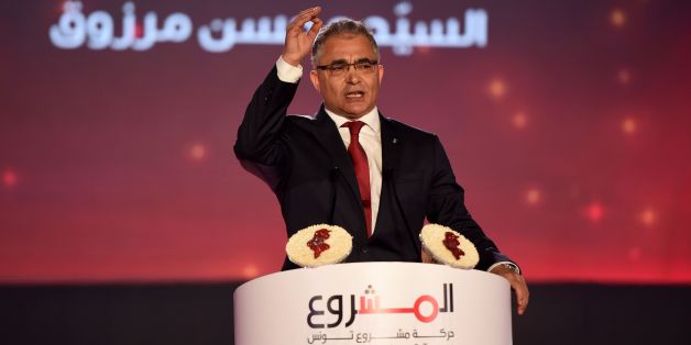 The General Secretary of Machrou3 Tounes Party Mohsen Marzouk gives a speech in Tunis on July 23, 2016 during the opening of the first congress of his new party that was formed following a split from the secular Nidaa Tounes party of the current Tunisian president. / AFP / FETHI BELAID (Photo credit should read FETHI BELAID/AFP/Getty Images)
