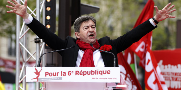 French far-left Parti de Gauche (PG) leader Jean-Luc Melenchon delivers a speech during a demonstration in Paris, May 5, 2013. The far-leftist Parti de Gauche called for a demonstration on Sunday against austerity and for the establishment of a "sixth republic", which includes diminishing the power of the president and increasing the parliament's authority, on the eve of the first anniversary of the election of French President Francois Hollande. The slogan on the podium reads, "For the sixth republic". REUTERS/Charles Platiau (FRANCE - Tags: POLITICS CIVIL UNREST BUSINESS)