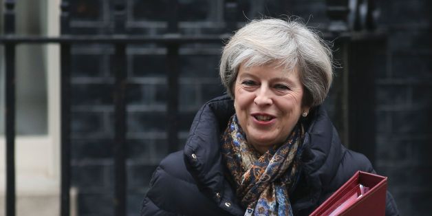 Britain's Prime Minister Theresa May leaves 10 Downing Street in central London on January 25, 2017 to attend the weekly Prime Minister's Questions in the House of Commons.
May was set to answer MP's question at Parliament a day after The Supreme Court's landmark ruling that the government must win parliament's approval before starting talks for Britain to leave the European Union. May will this week be the first foreign leader to meet with Donald Trump since his inauguration, aiming to discuss a key post-Brexit trade deal with the US. / AFP / Daniel LEAL-OLIVAS (Photo credit should read DANIEL LEAL-OLIVAS/AFP/Getty Images)