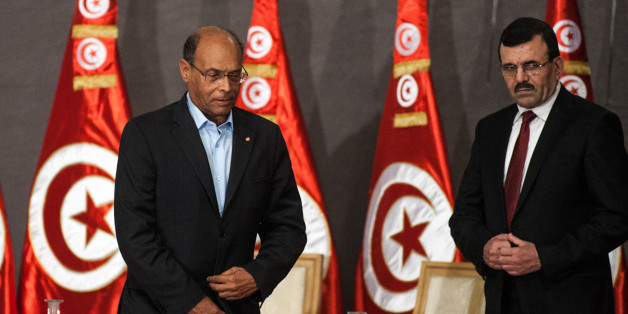 TUNIS, TUNISIA - OCTOBER 5: Tunisian President Moncef Marzouki (C), Tunisian Prime Minister Ali Laarayedh (R) and Tunisian Constituent Assembly President Mustapha Ben Jaafar (L) attend a meeting as part of the dialogue between Tunisia's ruling Islamists and the opposition at the Palais des Congres on October 5, 2013 in Tunis,Tunisia. (Photo by Amine Landoulsi/Anadolu Agency/Getty Images)