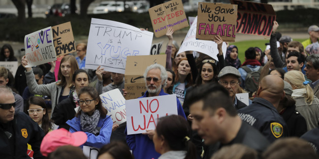 HOUSTON, TX - FEBRUARY 04: Protesters gather at City Hall to protest President Donald Trump during Super Bowl LI weekend on February 4, 2017 in Houston, Texas. (Photo by Tim Warner/Getty Images)