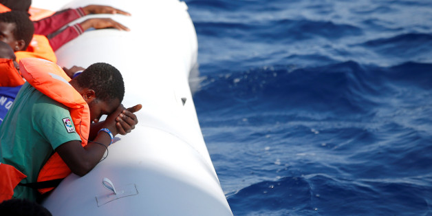Migrants are seen during rescue operation in the Mediterranea Sea October 20, 2016. Yara Nardi/Italian Red Cross press office/Handout via Reuters ATTENTION EDITORS - THIS IMAGE WAS PROVIDED BY A THIRD PARTY. EDITORIAL USE ONLY.