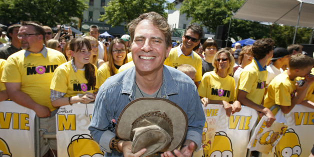 Director David Silverman smiles as he arrives for the premiere of the film "The Simpsons Movie" in Springfield, Vermont July 21, 2007. The tranquil New England community of 9,300 people beat 13 other Springfields in the United States in an online poll last week for the honor of hosting "The Simpsons Movie" premiere on Saturday -- six days before its nationwide release on July 27. REUTERS/Lucas Jackson (UNITED STATES)