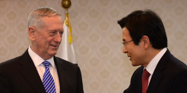 South Korea's acting President Hwang Kyo-ahn (R) greets US Defense Secretary James Mattis (L) prior their meeting at the Government Complex in Seoul on February 2, 2017.Mattis arrived in South Korea on February 2 on the first leg of a trip that also includes Japan, two key allies rattled by Donald Trump's isolationist ascent to power. / AFP / POOL / SONG Kyung-Seok (Photo credit should read SONG KYUNG-SEOK/AFP/Getty Images)