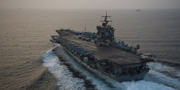 The aircraft carrier USS Enterprise is seen underway on her 25th and final deployment in this September 27, 2012 handout photo courtesy of the U.S. Navy. The Enterprise, which was christened in 1960, will be inactivated during a ceremony at Naval Station Norfolk on December 1, 2012. REUTERS/U.S. Navy photo by Mass Communication Specialist 3rd Class Scott Pittman/Handout (UNITED STATES - Tags: MILITARY MARITIME TRANSPORT) FOR EDITORIAL USE ONLY. NOT FOR SALE FOR MARKETING OR ADVERTISING CAMPAIGNS. THIS IMAGE HAS BEEN SUPPLIED BY A THIRD PARTY. IT IS DISTRIBUTED, EXACTLY AS RECEIVED BY REUTERS, AS A SERVICE TO CLIENTS
