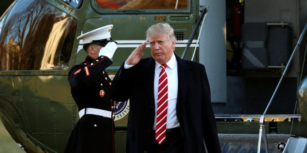 U.S. President Donald Trump returns a salute as he steps from Marine One upon his return to the White House in Washington February 6, 2017. REUTERS/Kevin Lamarque