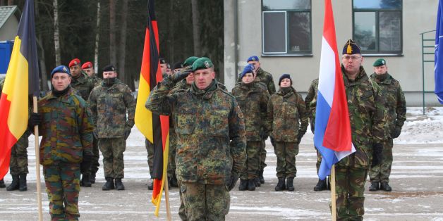 Commander of the NATO battalion battlegroup and the German contingent in Lithuania Lieutenant Colonel Christoph Huber salutes during a welcoming ceremony in Rukla, Lithuania, on February 7 , 2017.
Lithuania welcomed several hundred German troops who will lead a multinational NATO battalion, one of four the alliance is deploying on a rotational basis this year to deter Russia by beefing up its eastern flank. / AFP / Petras Malukas (Photo credit should read PETRAS MALUKAS/AFP/Getty Images)