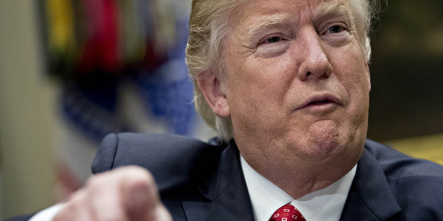 WASHINGTON, DC - FEBRUARY 7: (AFP OUT) U.S. President Donald Trump speaks as he meets with county sheriffs during a listening session in the Roosevelt Room of the White House on February 7, 2017 in Washington, DC. The Trump administration will return to court Tuesday to argue it has broad authority over national security and to demand reinstatement of a travel ban on seven Muslim-majority countries that stranded refugees and triggered protests. (Photo by Andrew Harrer - Pool/Getty Images)